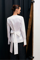 Acaria Studio Journey Shirt with long sleeves, lightweight fabric, and casual fit, shown in a neutral color.