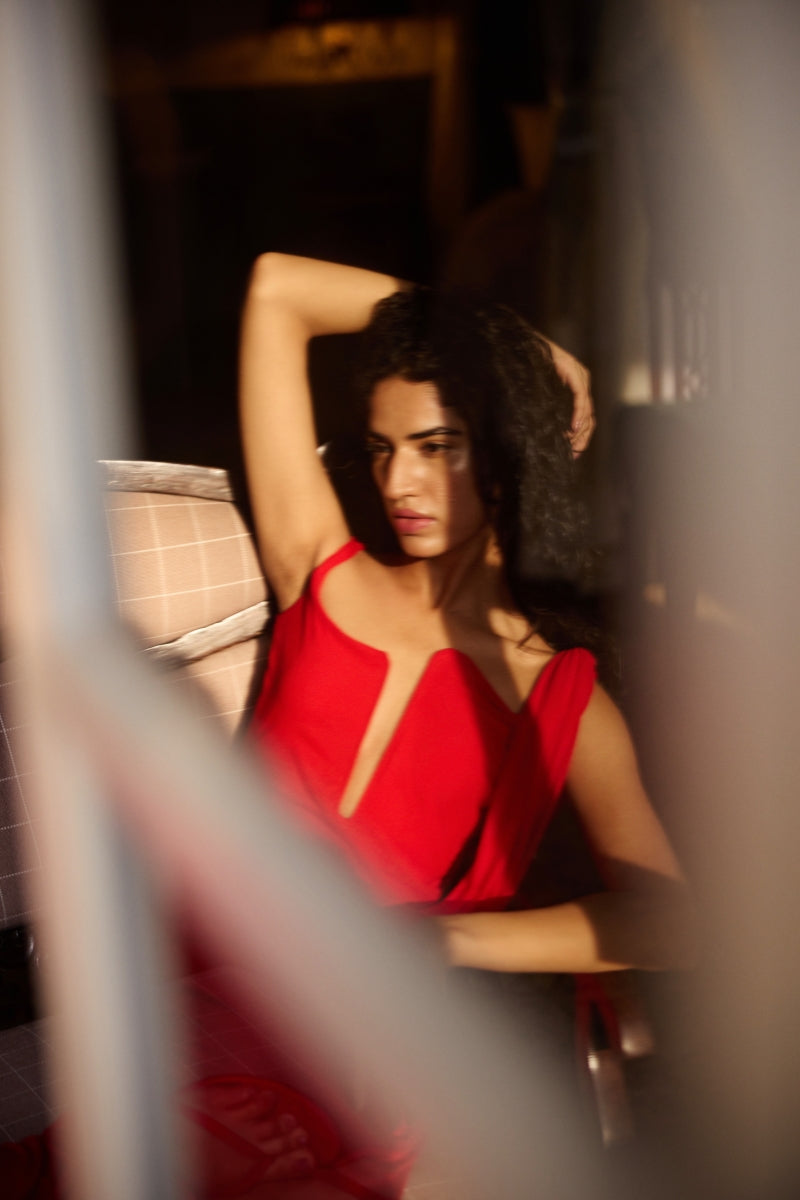 Deme By Gabriella Adriana red maxi dress with flowing fabric and sleeveless design, perfect for elegant summer occasions.