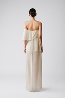 Tan vanilla drape maxi dress by TONYY featuring flowing fabric and elegant design, perfect for casual or formal occasions.