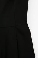 Black asymmetric-beck sleeveless jumpsuit by JINSUN, featuring a stylish one-shoulder design and tailored fit.