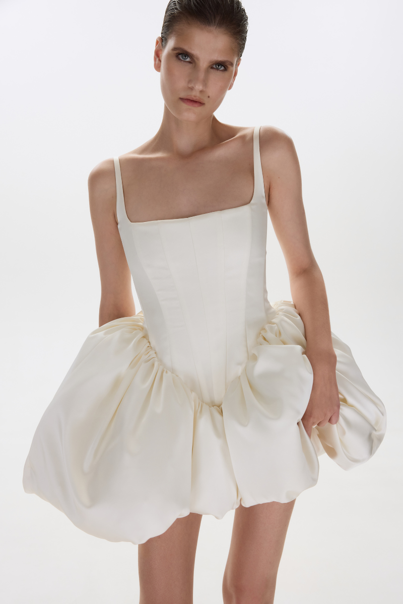 BalYKINA Charlotte ivory mini dress featuring a fitted silhouette and elegant design, perfect for stylish occasions.