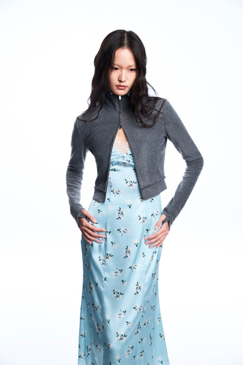 Chictopia floral slip midi dress with thin straps and a flowy, patterned fabric, perfect for spring and summer wear.