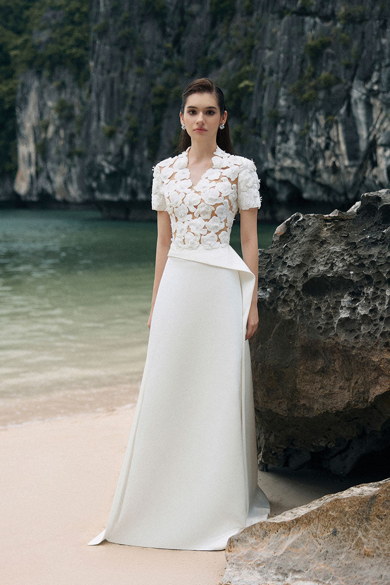 White satin taffeta gown by Lune De Soie, elegant formal dress with flowing fabric and intricate design details.