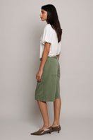 TT Studios PAM shorts in green with a relaxed fit, featuring a casual design perfect for summer wear.