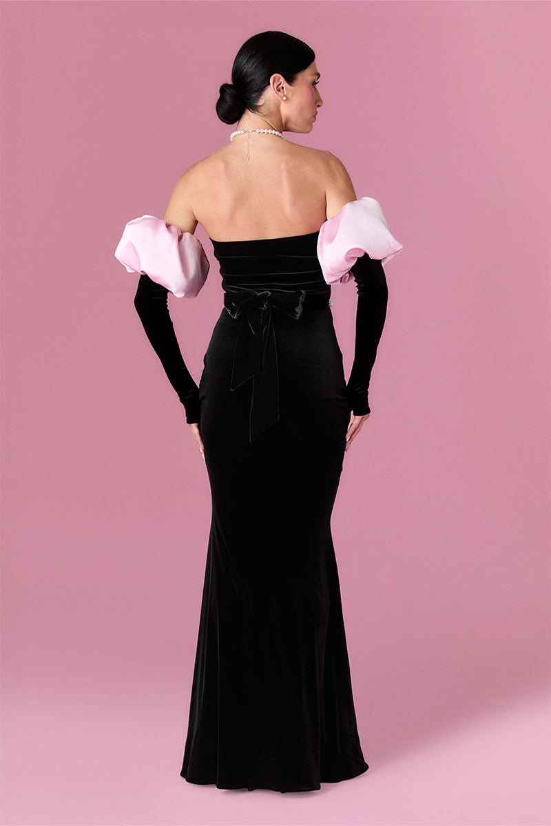 Elegant royal allure gown by Nur Karaata featuring intricate detailing and flowing fabric, perfect for formal occasions.