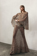 Nazlı Ceren VIONA crochet cape in antique bronze, showcasing intricate crochet details and flowing design for stylish outerwear.