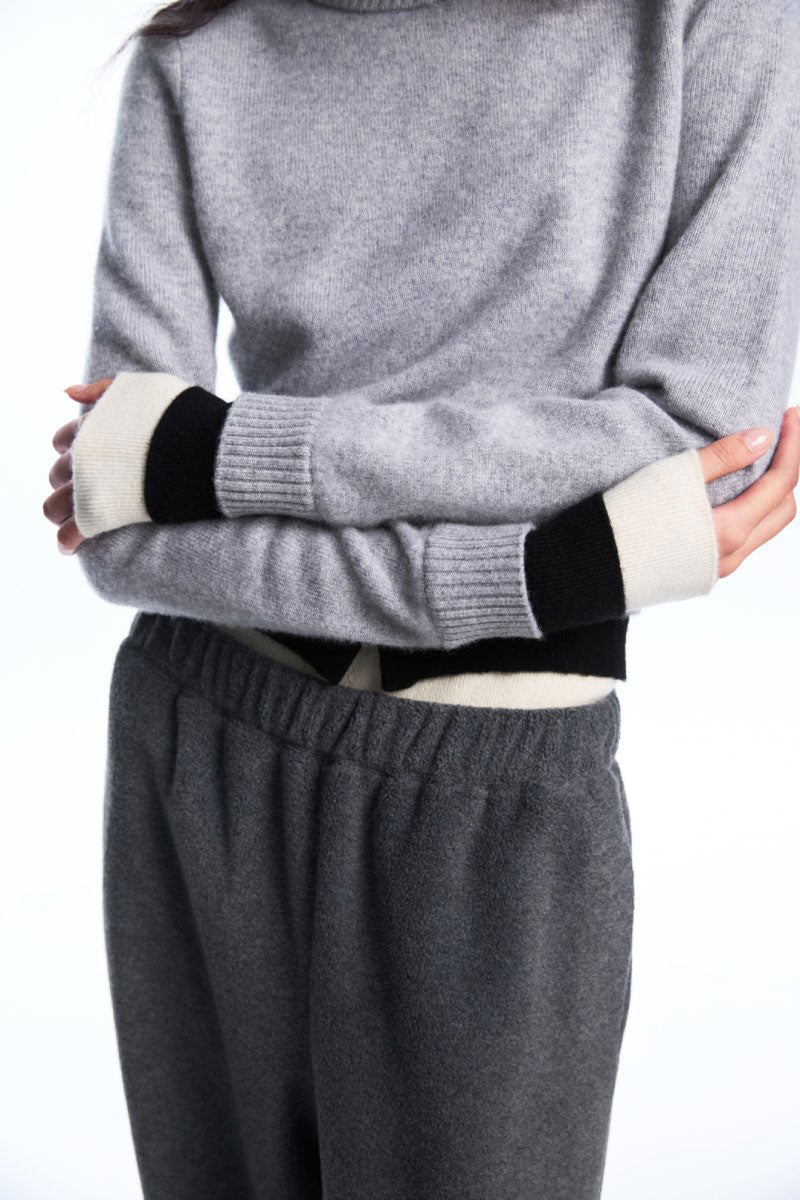 Chictopia layered grey cashmere sweater with a cozy, stylish design, perfect for casual wear and cold weather comfort.