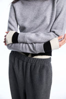 Chictopia layered grey cashmere sweater with a cozy, stylish design, perfect for casual wear and cold weather comfort.