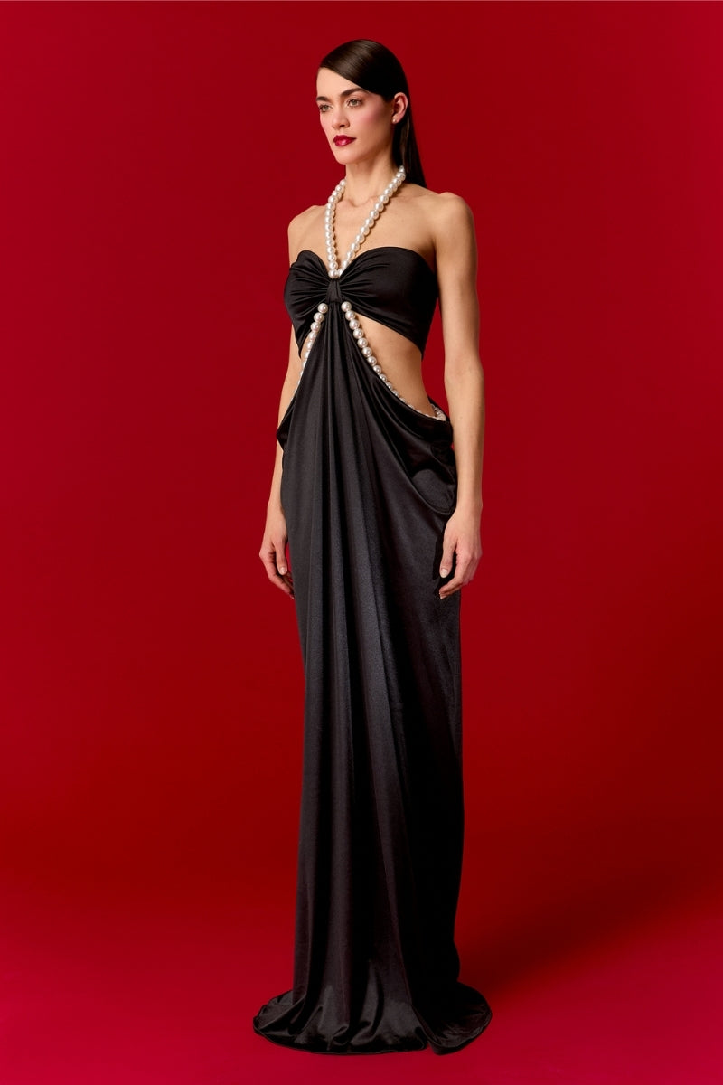 Nur Karaata Alice Pearl Maxi Dress displayed with elegant pearl accents, flowing fabric, and a stylish silhouette.