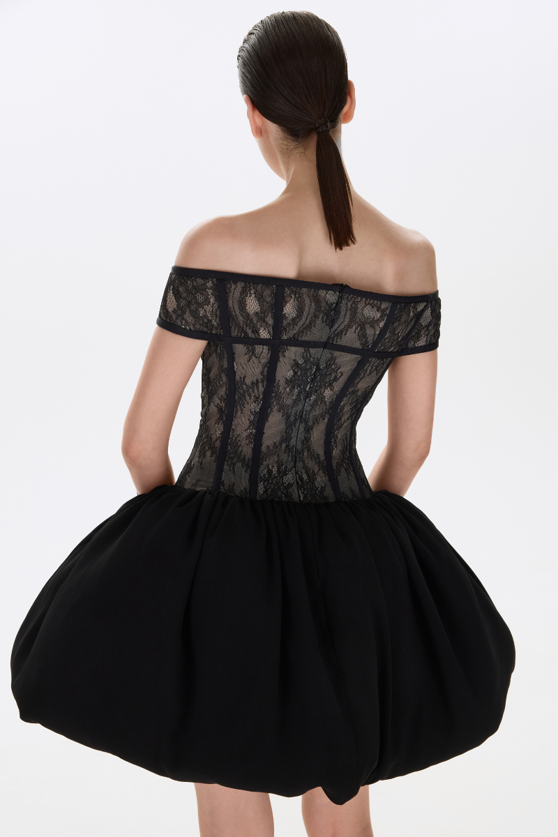 Black THEA mini dress by BALYKINA, featuring a fitted silhouette and stylish design, displayed on a mannequin.