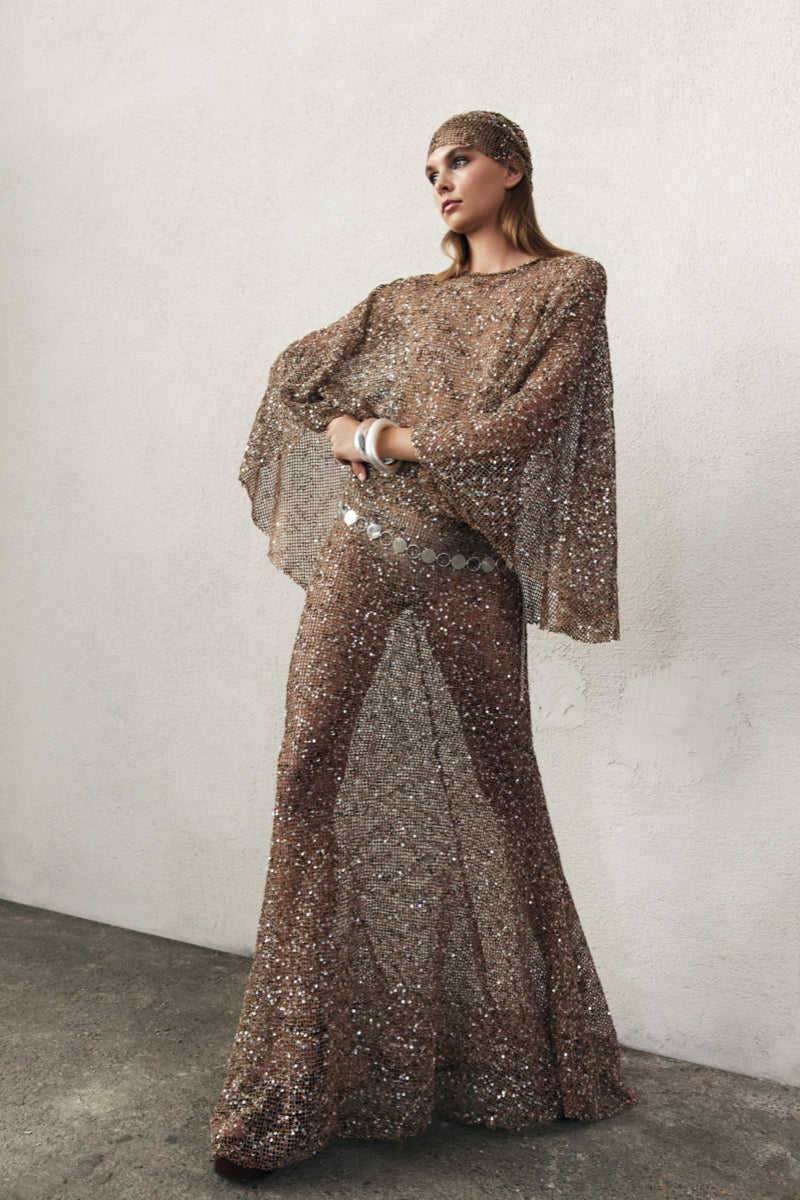 Nazlı Ceren crochet maxi skirt in antique bronze with intricate crochet details and flowing fabric, perfect for boho style.