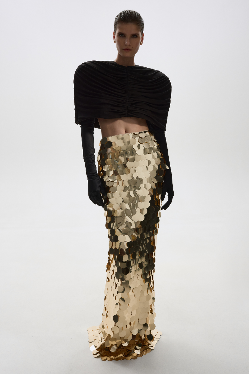 Black Balykina stretch cape jacket displayed flat, showing its sleek design and versatile style for fashion wear.