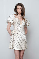 Do Long Rose Dot Mini Dress featuring a stylish mini dress with a floral rose dot pattern and a fitted silhouette.