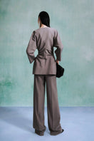 Gray Leicia long sleeve shirt with a fitted silhouette and round neckline, shown on a model.