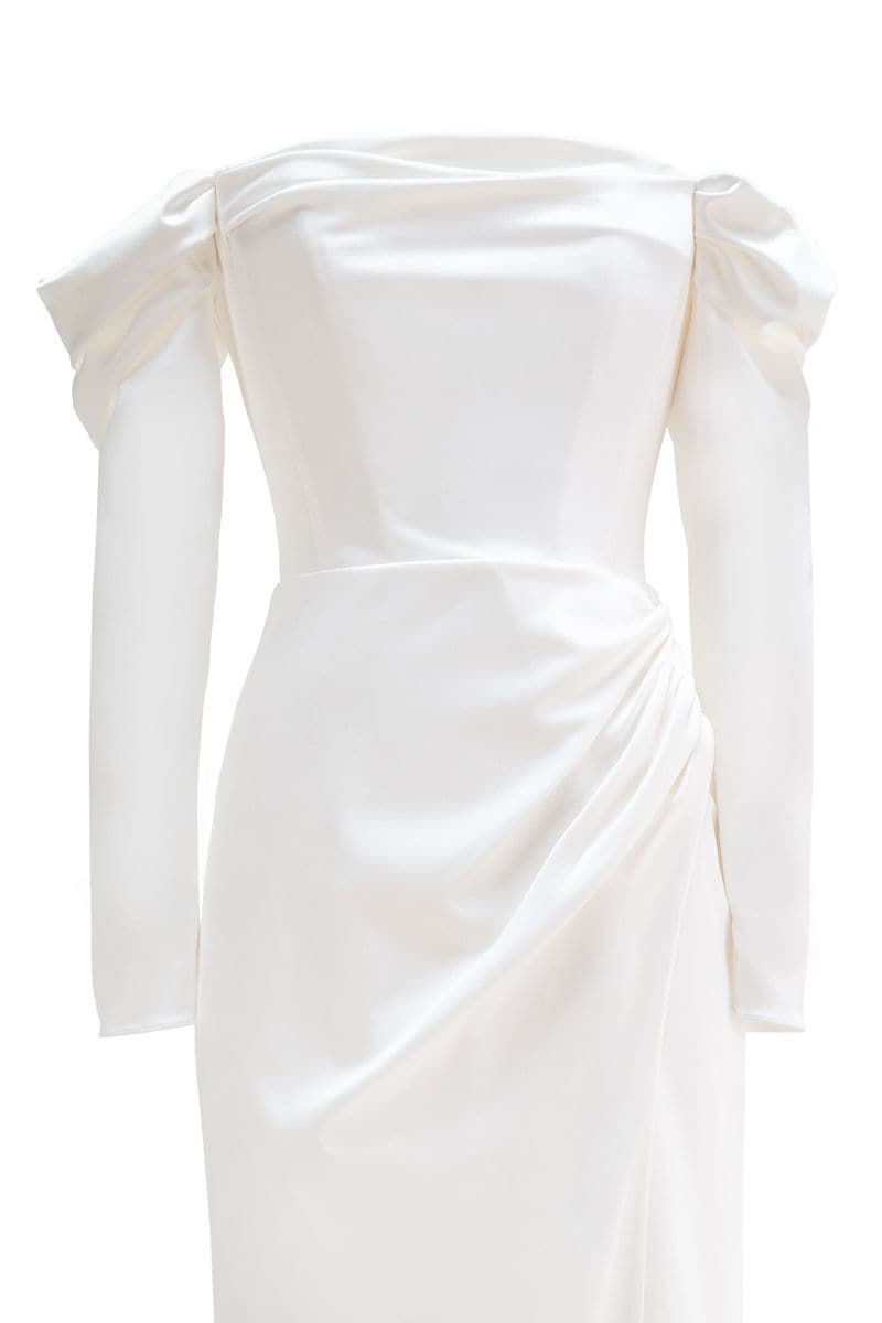 Elegant Cult Mia X Monetre draped gown in soft fabric, featuring a flowing silhouette and subtle detailing.