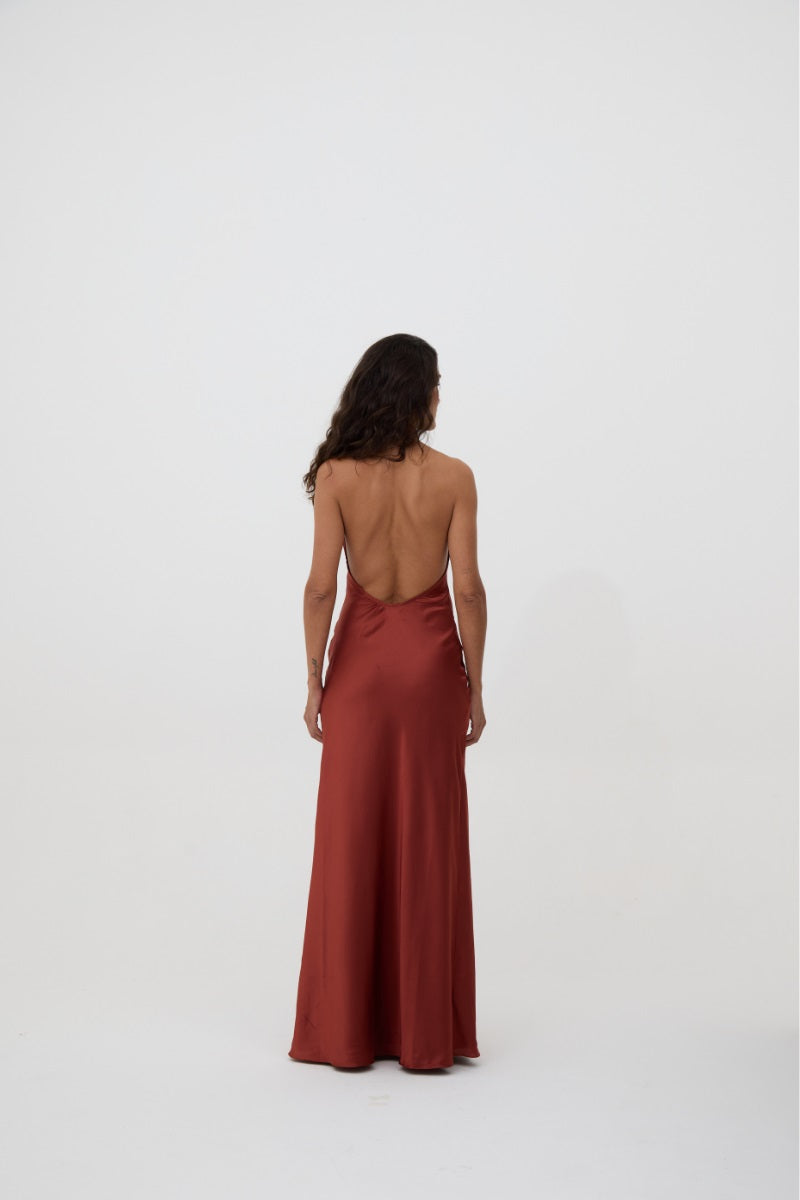 Dark red Lilian slip dress by Kontenta, a stylish maxi dress with a flowing silhouette and elegant design.
