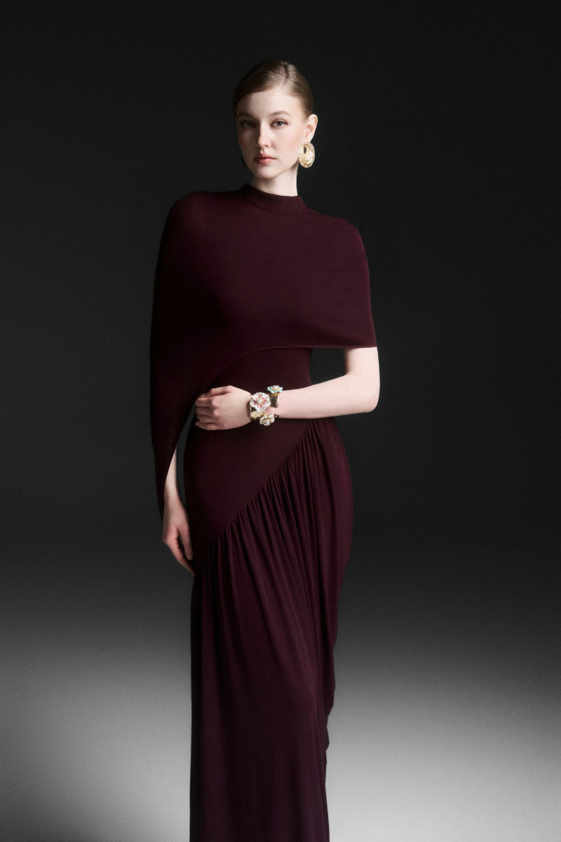 Maison Des Copains purple ruched floor-length gown with elegant draping and fitted bodice, perfect for formal occasions.