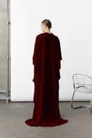 Nazlı Ceren Bordeaux Caro Crepe Cape jacket displayed on a mannequin, showcasing its elegant design and textured fabric.