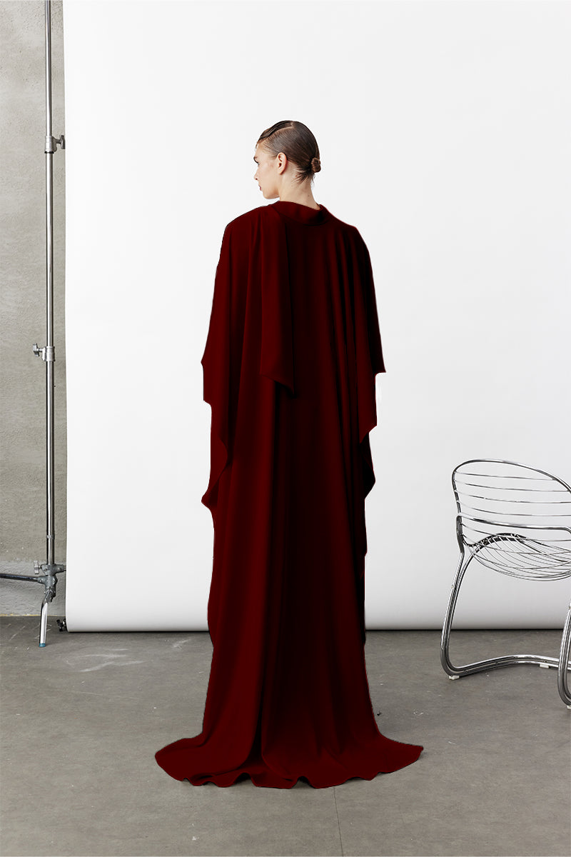 Nazlı Ceren Bordeaux Caro Crepe Cape jacket displayed on a mannequin, showcasing its elegant design and textured fabric.