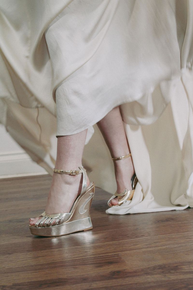 Gold Margaux heels by Terry de Havilland, featuring elegant high-heeled footwear with a shiny metallic finish.
