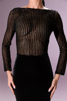 Nur Karaata AURELINE gown with elegant design and flowing fabric, perfect for formal occasions.