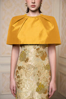 Yellow I.H.F floral sleeveless gown with round neck, featuring a flowing fabric and vibrant floral pattern.