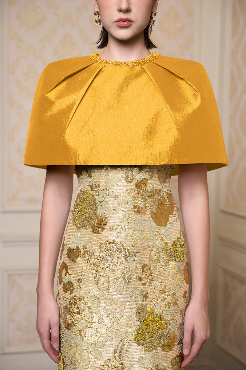 Yellow I.H.F floral sleeveless gown with round neck, featuring a flowing fabric and vibrant floral pattern.