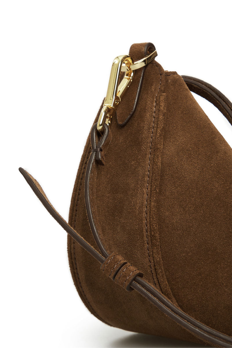 Brown suede Denise mini shoulder bag by Vikele Studio, featuring a compact design with a sleek strap and stylish finish.