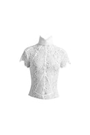 Deme By Gabriella Florence off-white top, lightweight fabric, with a relaxed fit and elegant neckline, displayed on a hanger.