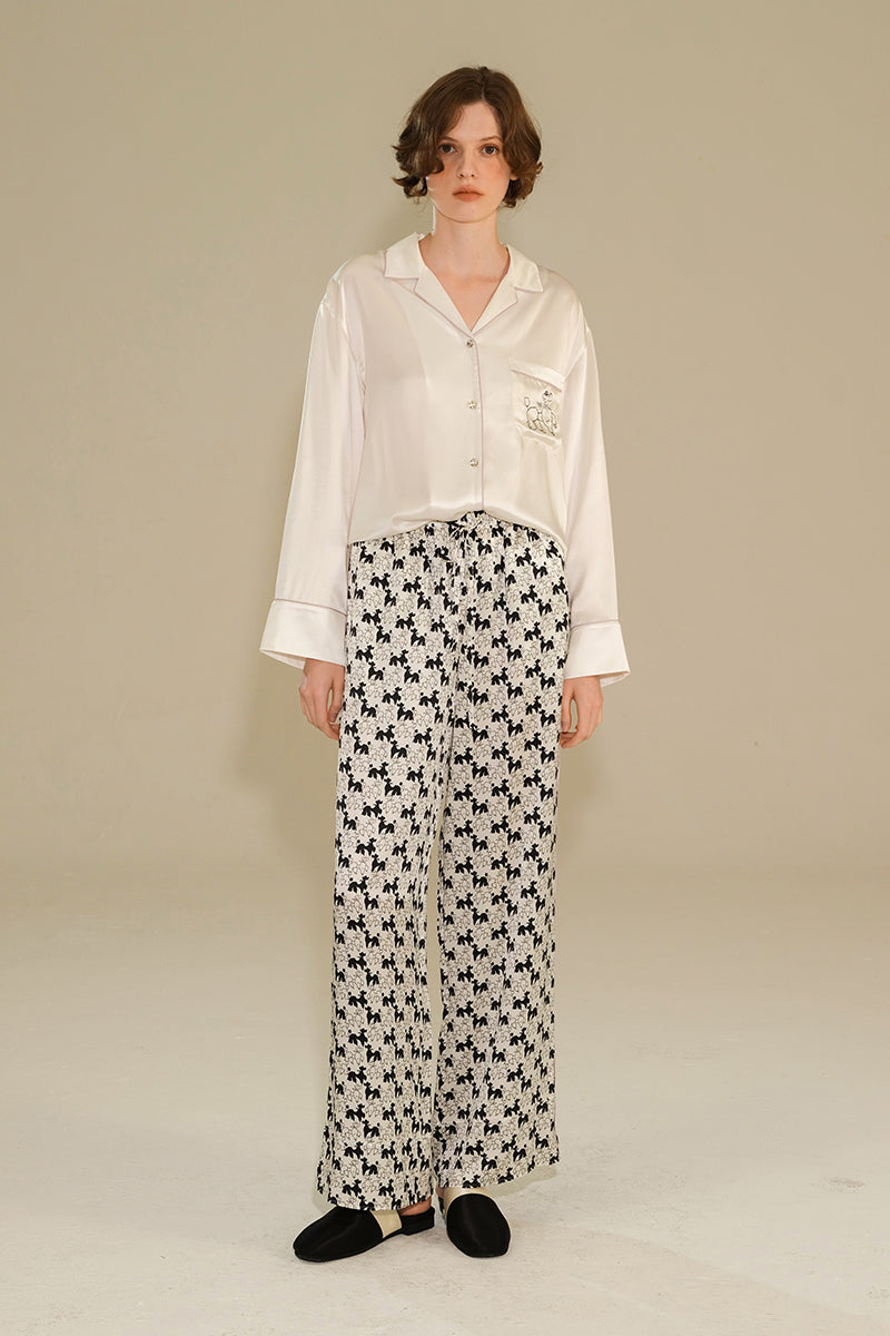 Diamond Poodles contrast silk pajamas set by Not Just Pajama, featuring a stylish loungewear design with poodle pattern on smooth silk fabric.