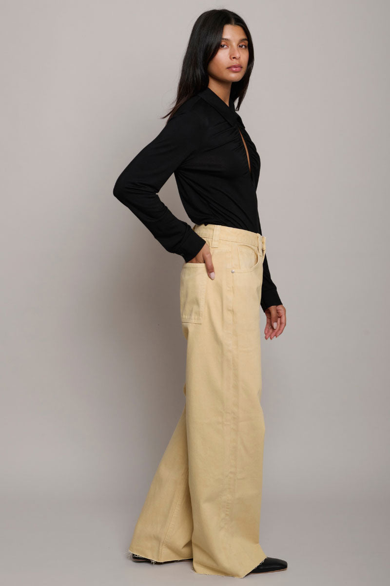 TT Studios Audrey Jean in Rodeo Dr. featuring classic blue denim, front pockets, and a slim fit design.