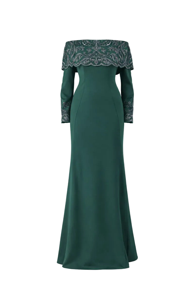 Raishma Maria Green Gown showcasing elegant fabric and flowing design, perfect for formal occasions.
