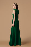 Green crepe de chine A-line gown by I.H.F, featuring elegant flowing fabric and a flattering silhouette.