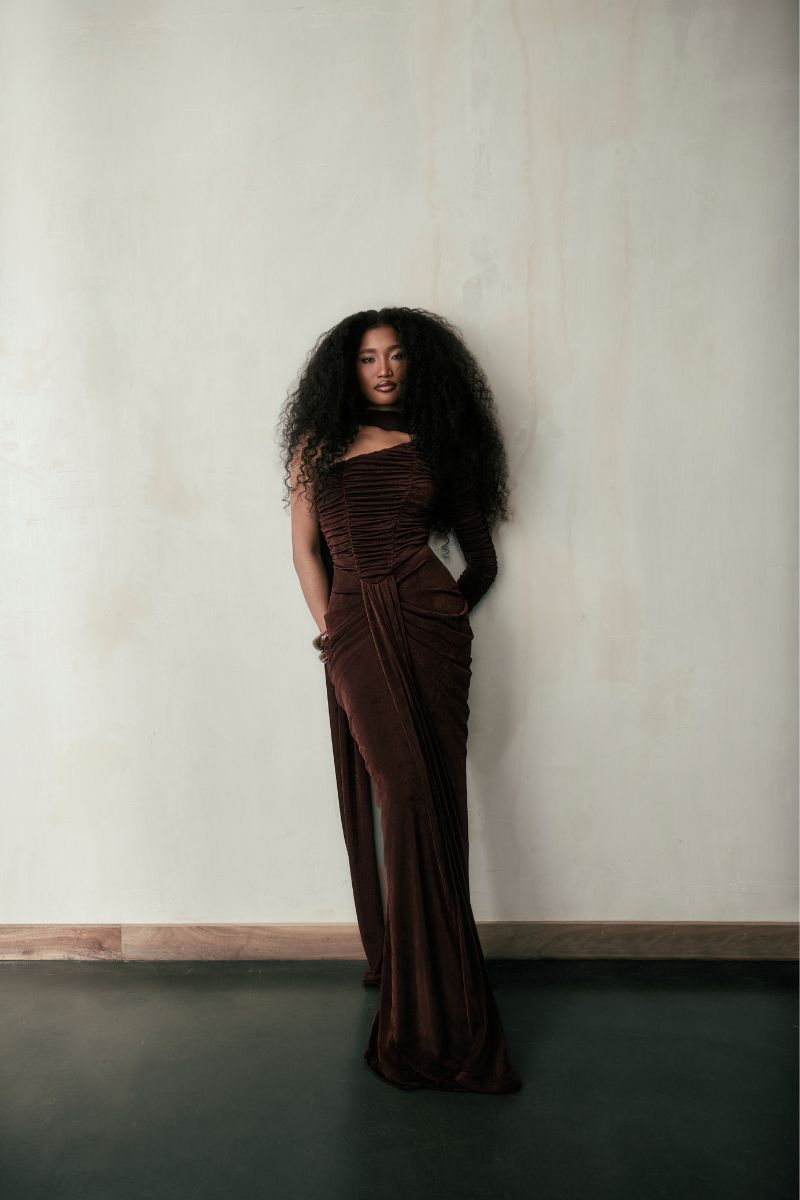 KEMMIYE brown maxi dress by Khanum's featuring flowing fabric and elegant design, perfect for casual or formal occasions.