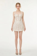 Beige Eveline lace mini dress by 21Six, featuring intricate lace details, fitted silhouette, and elegant style.