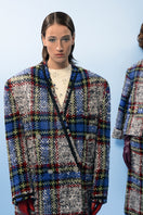 Lalo beige and blue checked wool coat displayed on a hanger, showcasing its classic pattern and tailored fit.