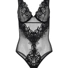 Black OOLOG Bodysuit by Entos, featuring a sleek fit and smooth fabric, displayed on a model against a neutral background.