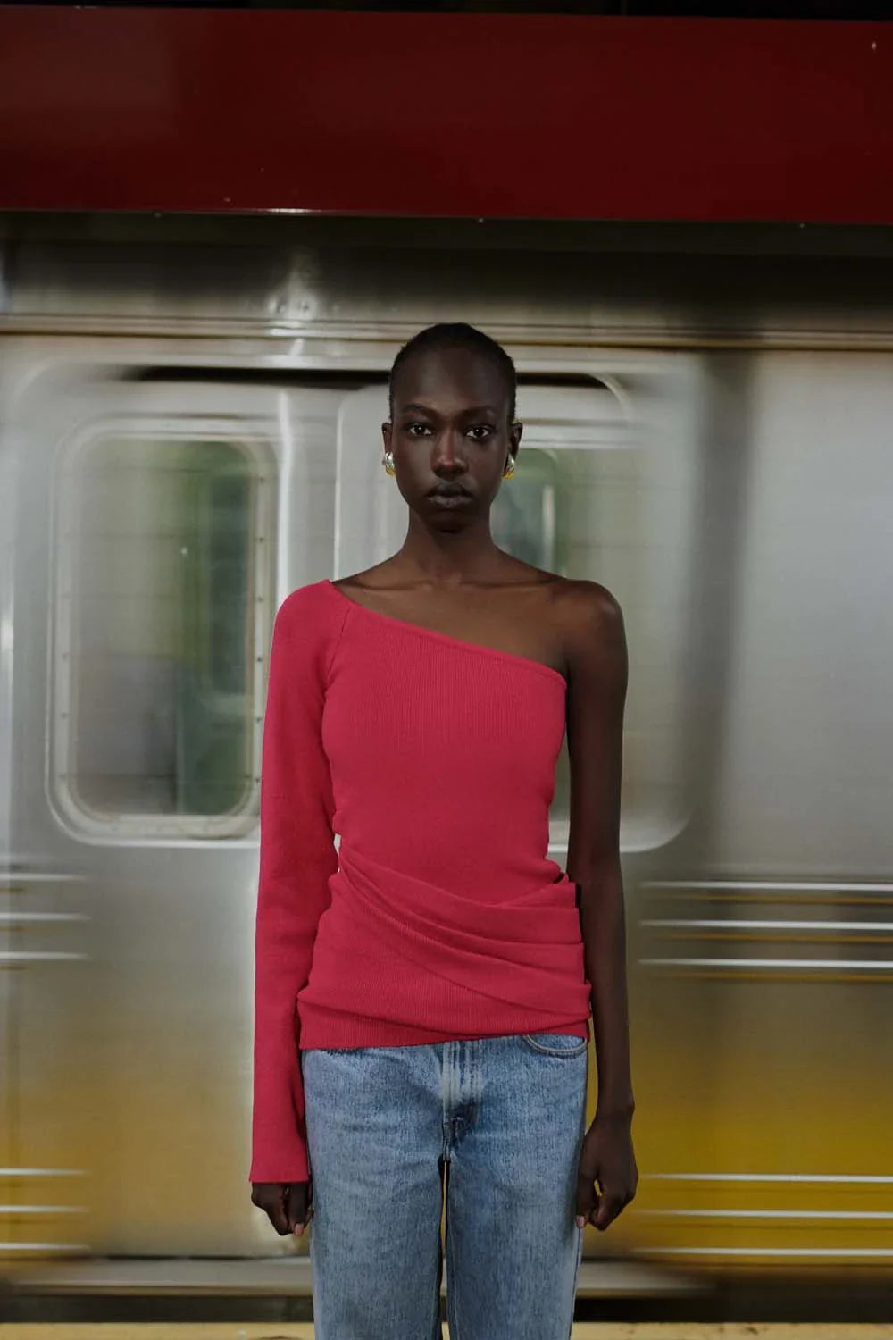 Baobab Kairi top in bubblegum pink, stylish sleeveless blouse with a fitted design, perfect for casual or trendy outfits.