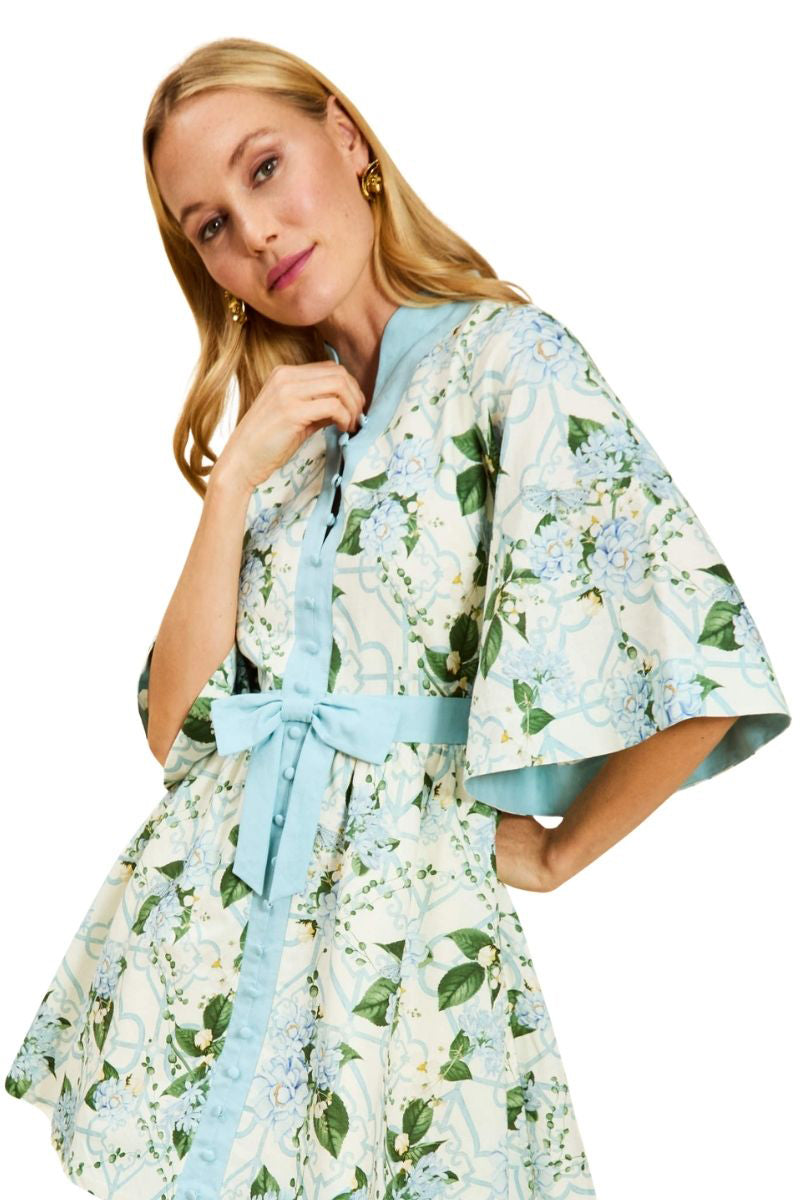 Mestiza New York Carmen mini dress in Quatrefoil Garden pattern, featuring a fitted silhouette and floral print fabric.