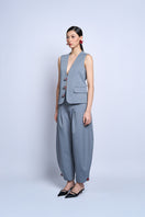 Aidan & Ice Solace gray vest with a fitted design, featuring a smooth fabric and subtle stitching details on a neutral background.