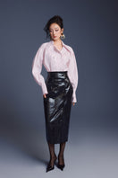 Black leather sculpted midi skirt by Keira Tong, featuring a fitted silhouette and sleek design.
