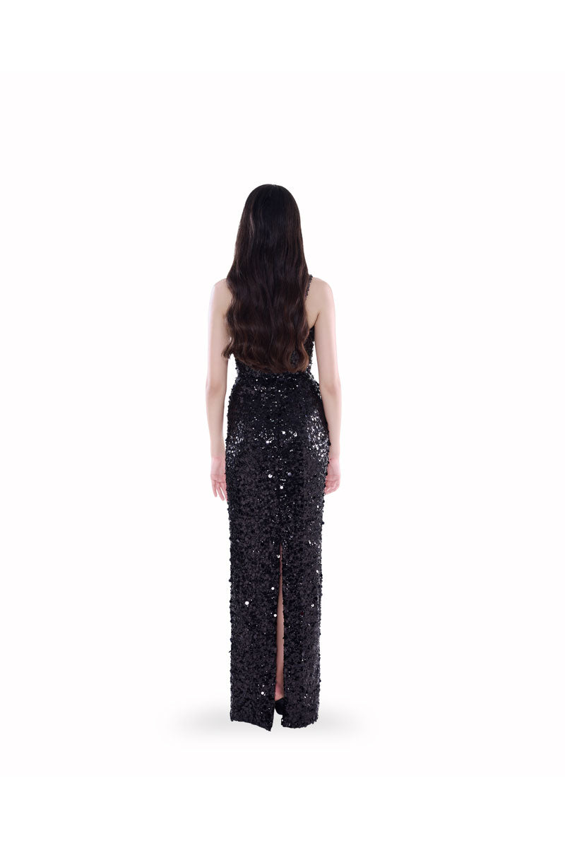 Black Luna sequin gown by HACCHIC COUTURE, elegant maxi dress with shimmering sequins and flowing fabric for formal occasions.