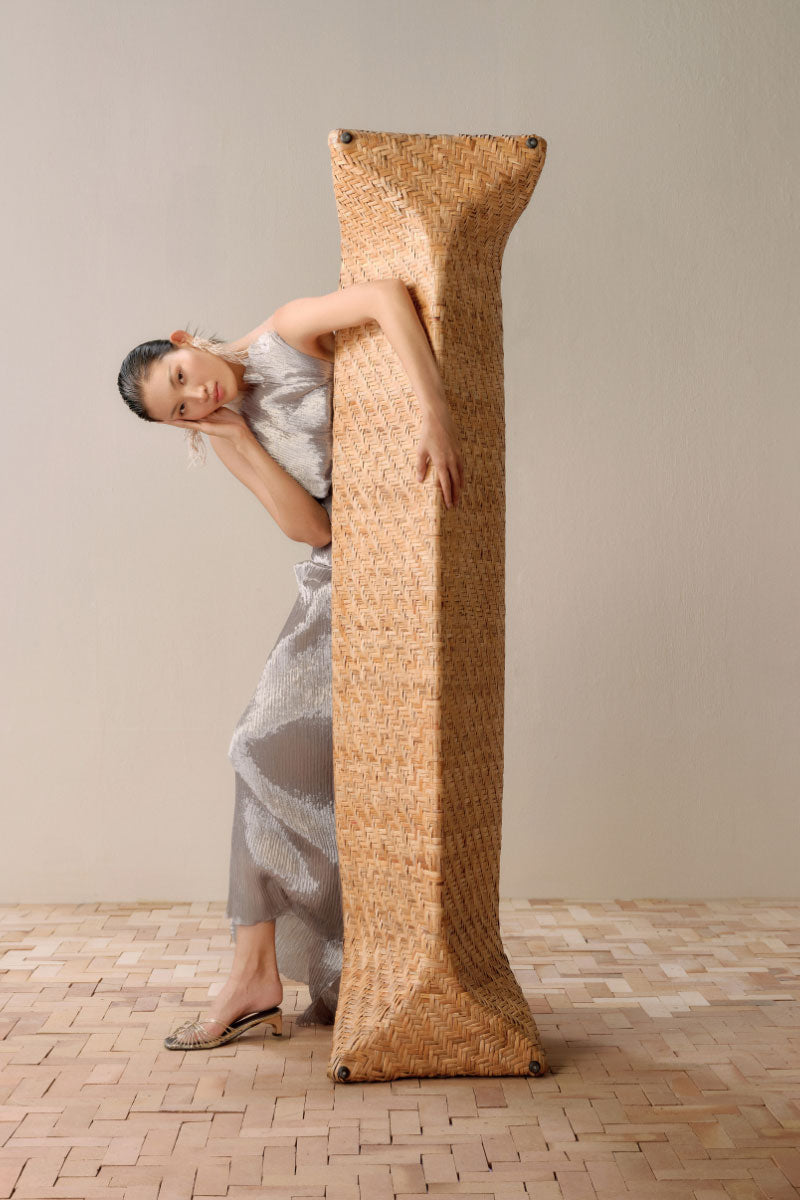 Silver Sand gown in silver maxi dress by Lecia, featuring a flowing fabric and elegant design for formal occasions.