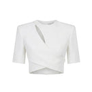 White diagonal wrap top by Keira Tong, featuring a stylish V-neck and long sleeves, shown on a model.