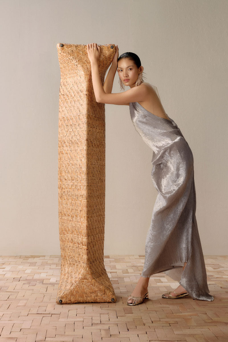 Silver Sand gown by Lecia, elegant silver maxi dress with flowing fabric and subtle shine, perfect for formal occasions.