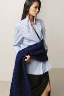 LECIA pinstripe gathered-cuff shirt with long sleeves, button front, and stylish cuff details, displayed on a hanger.