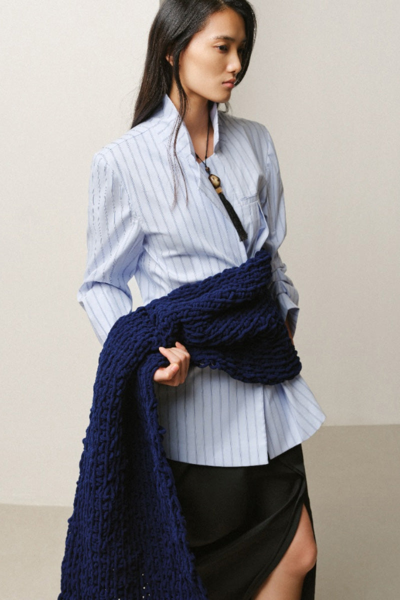 LECIA pinstripe gathered-cuff shirt with long sleeves, button front, and stylish cuff details, displayed on a hanger.