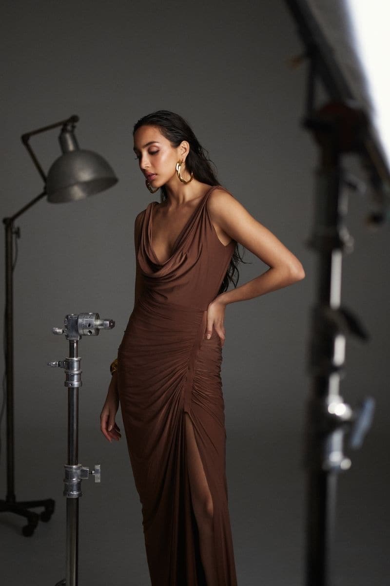 Deme by Gabriella CULT MIA X Deme maxi dress in flowing fabric with a vibrant pattern, sleeveless design, and ankle-length silhouette.