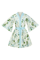 Mestiza New York Carmen mini dress in Quatrefoil Garden print, featuring a fitted silhouette and vibrant garden-inspired pattern.