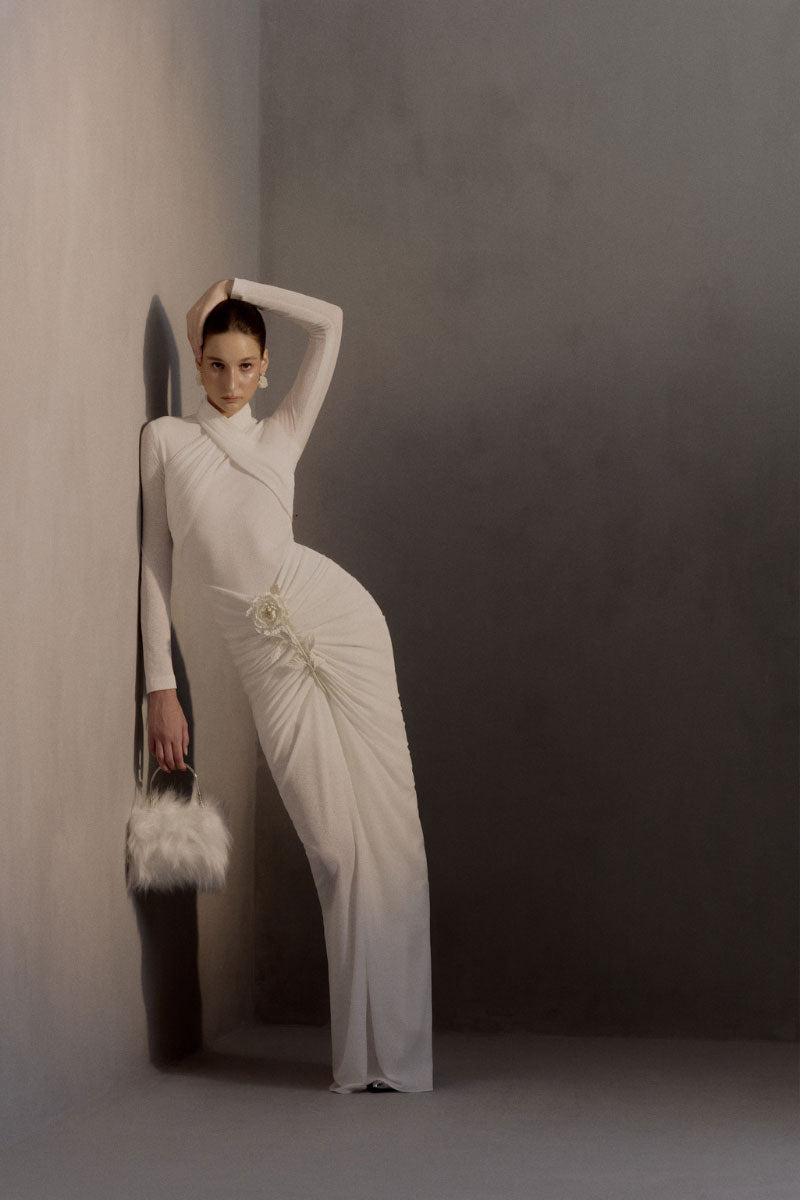 White Plan Armetis Dress gown, elegant design with flowing fabric and detailed neckline, perfect for formal occasions.